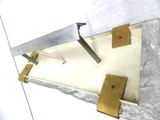 a knife that is sitting on top of a piece of paper