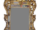 a mirror that is sitting on the wall