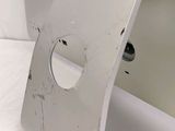 a close up of a piece of metal with a hole in it