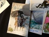 pictures of a couple on a sled in the snow