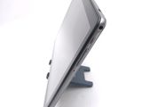 a close up of a tablet computer on a stand