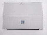 a white surface with a small window on it