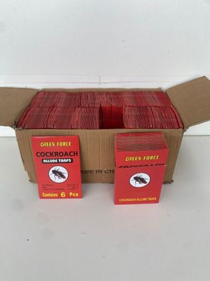 two boxes of cigarettes sitting in a cardboard box