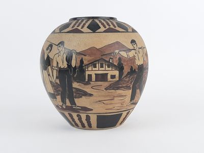 a vase that has a picture of a man and a woman on it