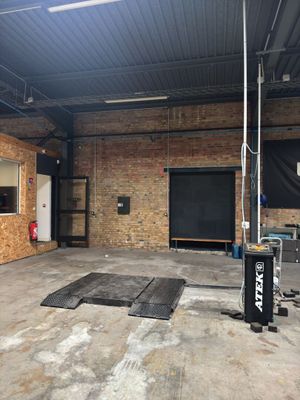 a room with a large screen in the middle of it