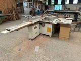 a picture of a table sawing machine in a workshop