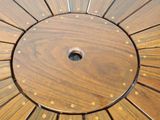 a close up of a wooden table with a hole in the center
