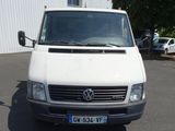 a white van that is parked in a parking lot
