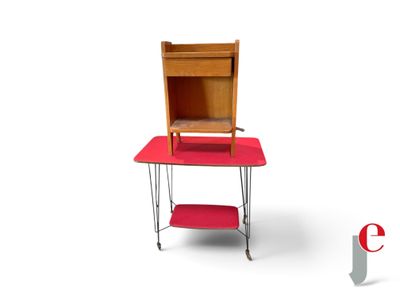 a small desk with a chair on top of it