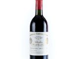 a bottle of wine that is sitting on a table
