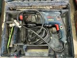 a box with tools in it on a table