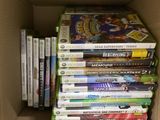une boîte en carton remplie de nombreux jeux vidéo différents