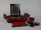 a small wooden box with a mirror on top of it