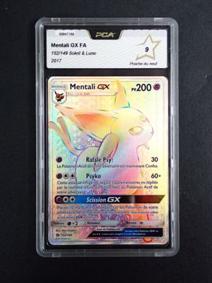 a close up of a pokemon card on a black surface