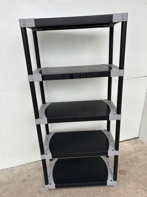 a close up of a black and silver shelf with four shelves