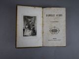 an old book with a picture of a woman on it