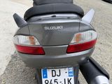 a motorcycle that is parked on the side of the street
