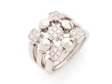 a close up of a diamond ring on a white background