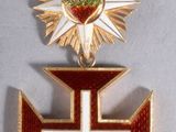 une image représentant une croix sur laquelle figurent un cœur et une autre croix