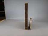 two books that are sitting on a table