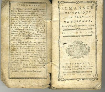 un livre ouvert sur lequel figure l'image d'un arbre