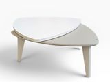 a white table with a wooden base and a white top