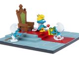 the smurfs are playing with their toys on the floor