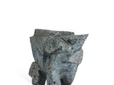 a statue of an elephant made out of rocks