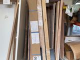 a lot of boxes and boxes on the floor in the garage