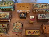many different types of tinned boxes on the table