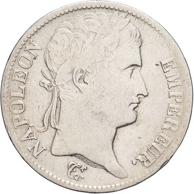 an old silver coin with a woman ' s profile on it