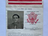 a close up of a passport with a picture of a man and an american flag