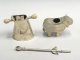 two silver objects on a white surface