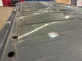 an image of a car being repaired in a garage