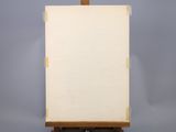 an easel with a blank canvas on it against a gray background