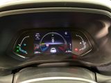 the dashboard of a car with a digital display on it