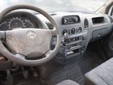 dashboard of a car with a steering wheel and dashboard controls