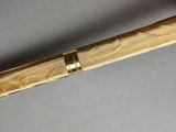 a close up of a baseball bat on a table