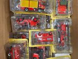 a box full of toy fire trucks and other toys