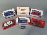 a lot of toy cars that are sitting on a table