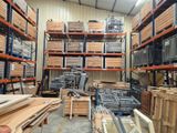 a large room with lots of wood in it