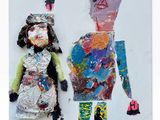 a picture of a picture of a couple of people made out of paper
