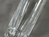 a clear glass that is sitting on a table