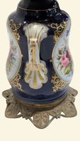 Paire de lampes à pétrole avec fûts galbés en porcelaine à d… (photo 2)
