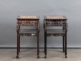 pair of chinese carved side tables with marble tops