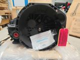 a close up of a blower motor on a box in a warehouse