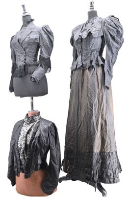 three different views of a woman ' s dress and jacket on a mannequin stand