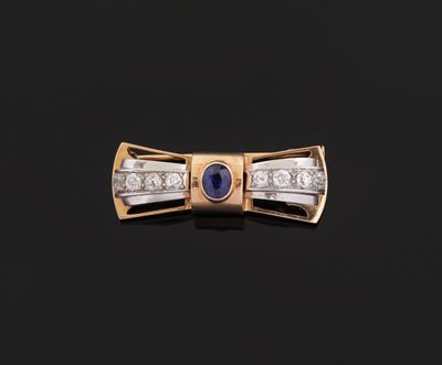 une broche en forme de nœud en or jaune 18 carats et diamants