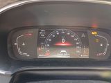a close up of a car dashboard with a speedometer