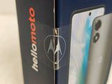 the box of the motorola phone is open on the table